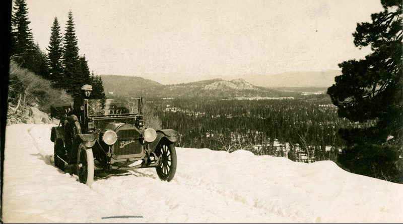 Grade near Echo summit. Placerville route. Highway 50. Showing a car.