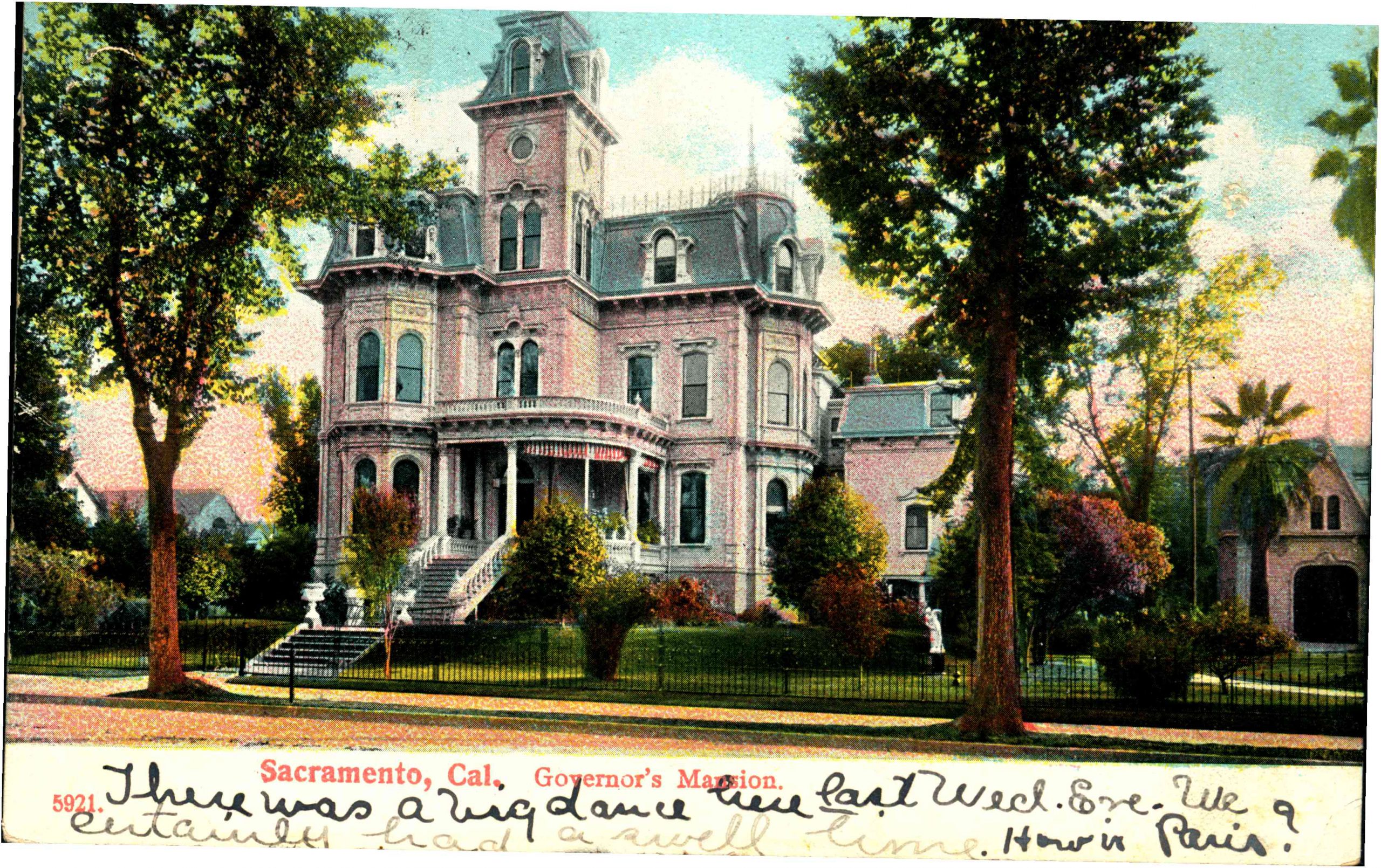 Shows the exterior of the Governor's Mansion, lawn, and trees