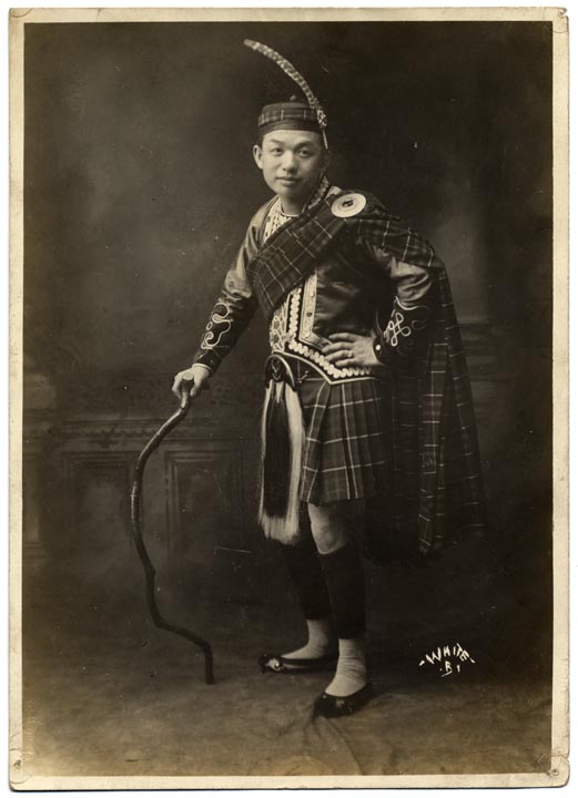 Lee Tung Foo in traditional Scottish kilt costume