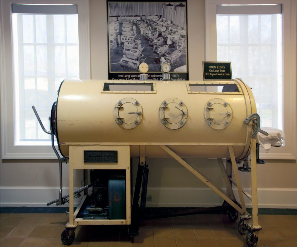 Image of an iron lung used to "breathe" for polio patients until 1955 when polio vaccine became available is located in the Mobile Medical Museum, Mobile, Alabama