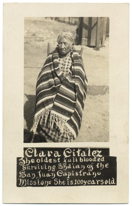 Portrait of Clara Citalez wrapped in a blanket